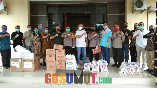 DPD REI Bersama Pengusaha Sumut Salurkan APD, Masker Dan Sembako Ke Polres Sergai