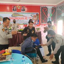Syukuran HUT ke 75 Bhayangkara di Polsekta Kotapinang Diwarnai Penyerahan Kursi Roda