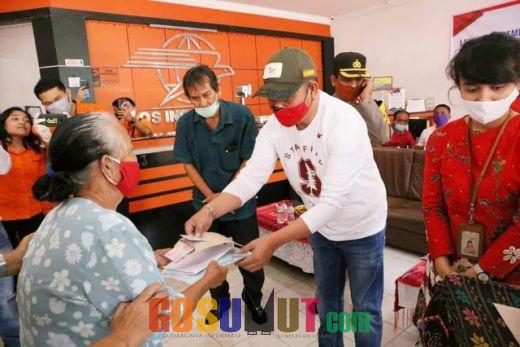 Bupati Taput Launching Bantuan Sosial Tunai KPM