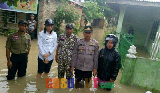 Air Sungai Padang Tebingtingi Meluap, Kapolsek Rambut Langsung Terjun ke Lokasi Banjir