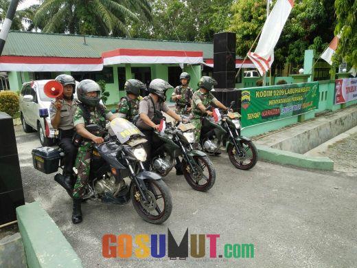 Babinsa Koramil 07/AKB dan Personel Polsek NA IX-X Kompak Berikan Imbauan Panglima TNI