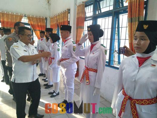 Senyum Haru Pengukuhan Paskibra HUT ke-78 RI Kecamatan Tambangan Madina