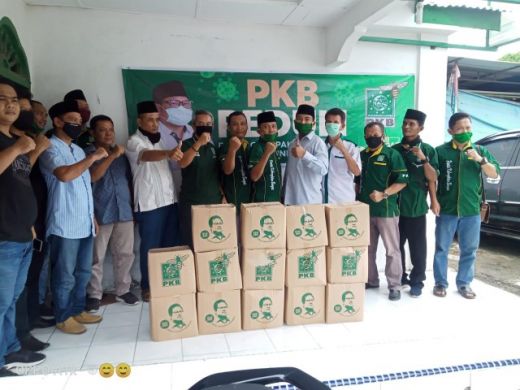 Bantuan Gus AMI, DPC PKB Sergai Salurkan 250 Paket Sembako Kepada Masyarakat