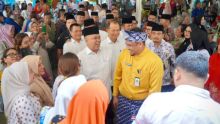 Disambut  Pj Bupati Langkat, Bobby Nasution Kenakan Busana Adat Melayu di Halal bi Halal