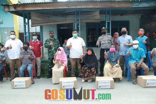 Bupati Labura Salurkan Paket Bantuan Sembako dari Pemerintah Provinsi Sumut