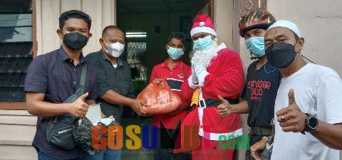 Ketua SPI Sumut Berbagi Berkah Natal di Kampung Sejahtera