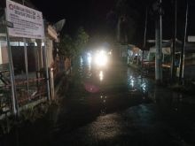 Jalan Pejuang 45 Sibuhuan Langganan Banjir Saat Hujan Turun