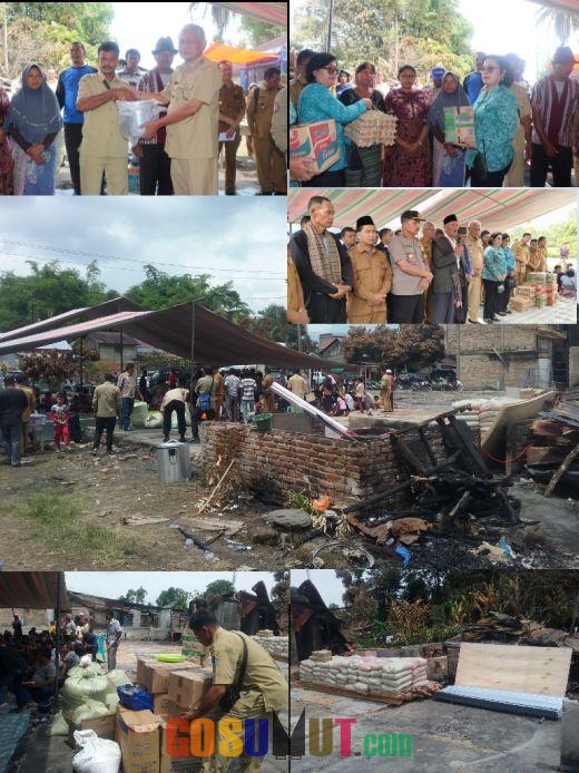 Bupati Tobasa Berikan Bantuan kepada 14 KK Korban Kebakaran Rumah di Desa Simpang Siguragura