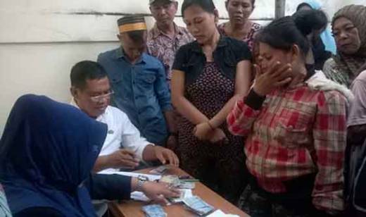 TNP2K: Mulai Januari 2017, Warga Medan Ambil Raskin Pakai Vouhcer