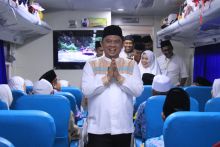 Bupati Erik Adtrada Turut Dampingi Perjalanan Calhaj Labuhanbatu Menuju Asrama Haji Medan