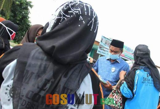 Darma Wijaya Bagikan 1.000 Masker kepada Warga Teluk Mengkudu